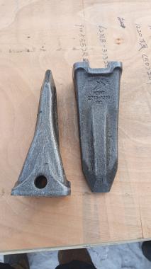 Зуб ковша 2713-1219RC / 230111-00090 / 713-00054A Doosan DX300